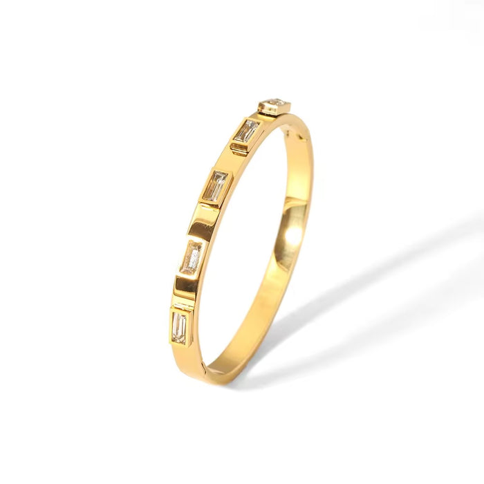 Pulsera de acero, baño de oro 18k con circonitas rectangulares