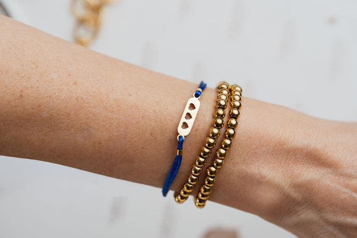 Pulseras de Carlota en brazo
