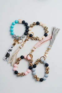 Llavero pulsera para carteras, diferentes colores con toque animal print