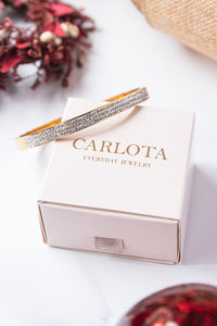 Pulsera de acero, oro y circonias en caja de CARLOTA