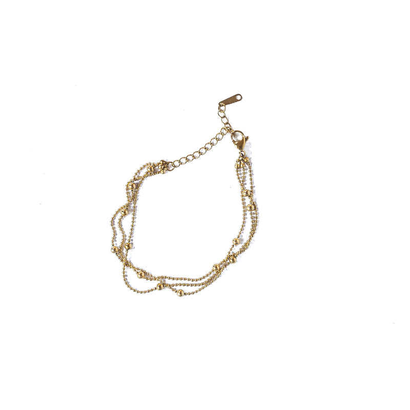 Pulsera triple en acero dorado con cuentas