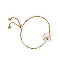 Pulsera ajustable con inicial de acero quirúrgico y baño de oro